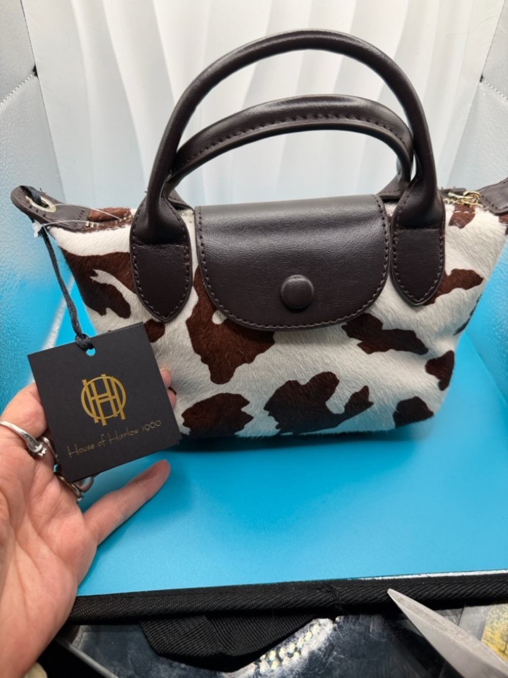 Cowhide Print Crossbody Bag in White and Brown